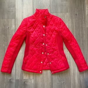 Bright red jacket with button and zipper closer